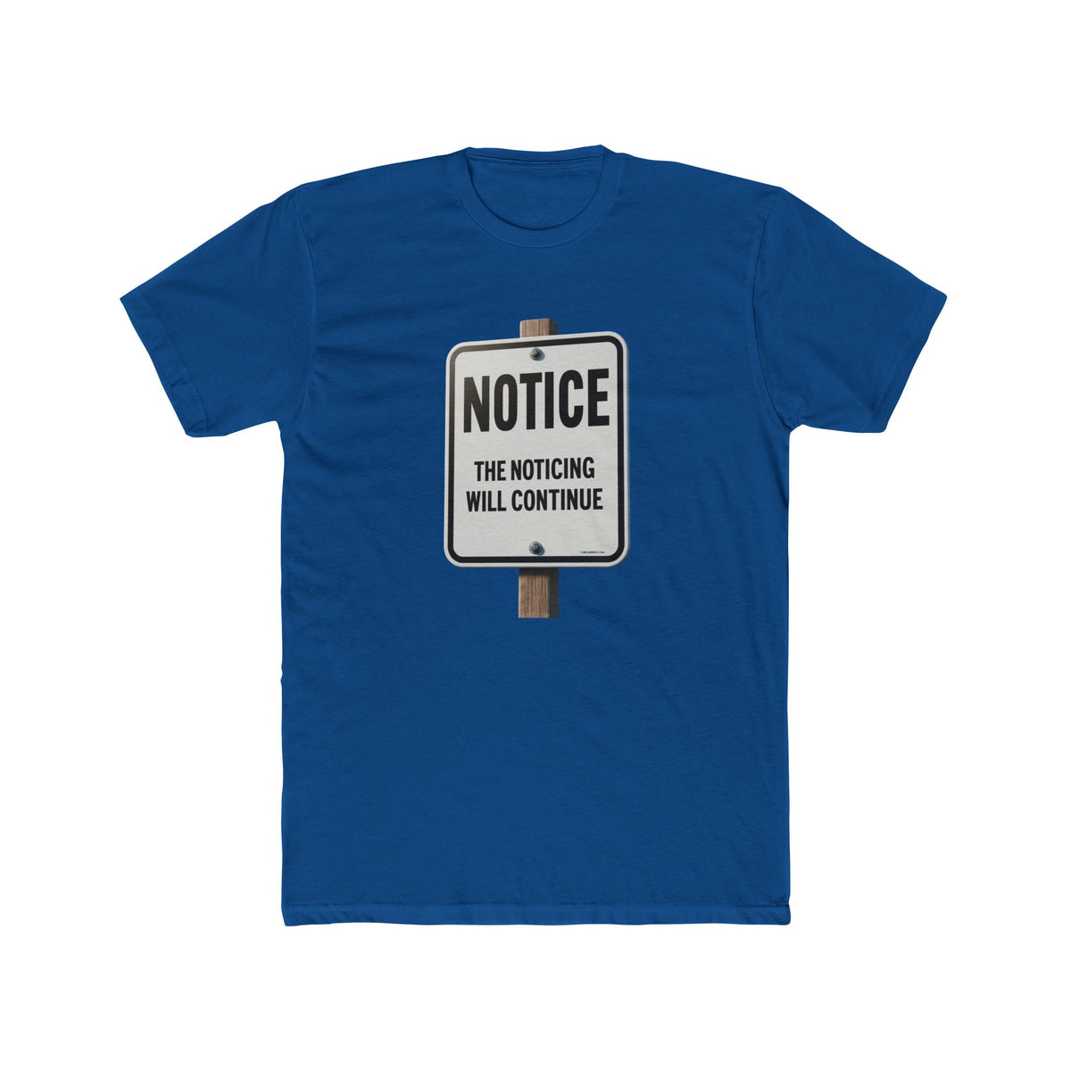 Notice, The Noticing t-shirt: road-sign style print reading Notice, the noticing will continue, on a Next Level 3600 tee.